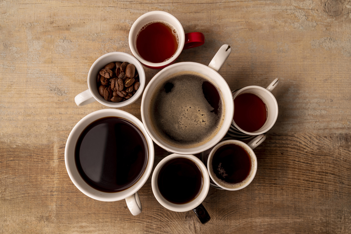 Top View Cups Coffee With Wooden Background